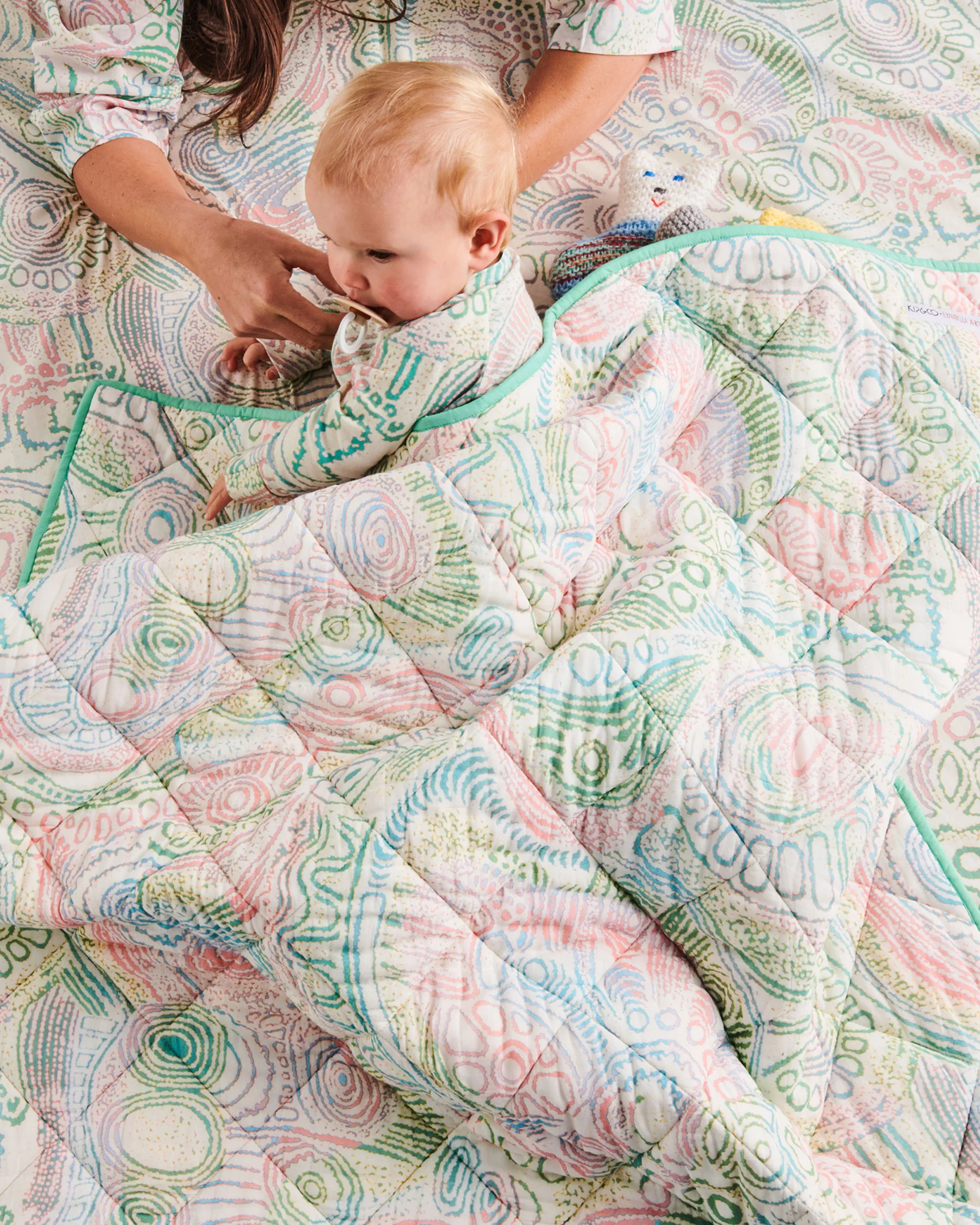 Tjala Tjukurpa Pastel Organic Cotton Quilted Cot Bedspread - Image 2