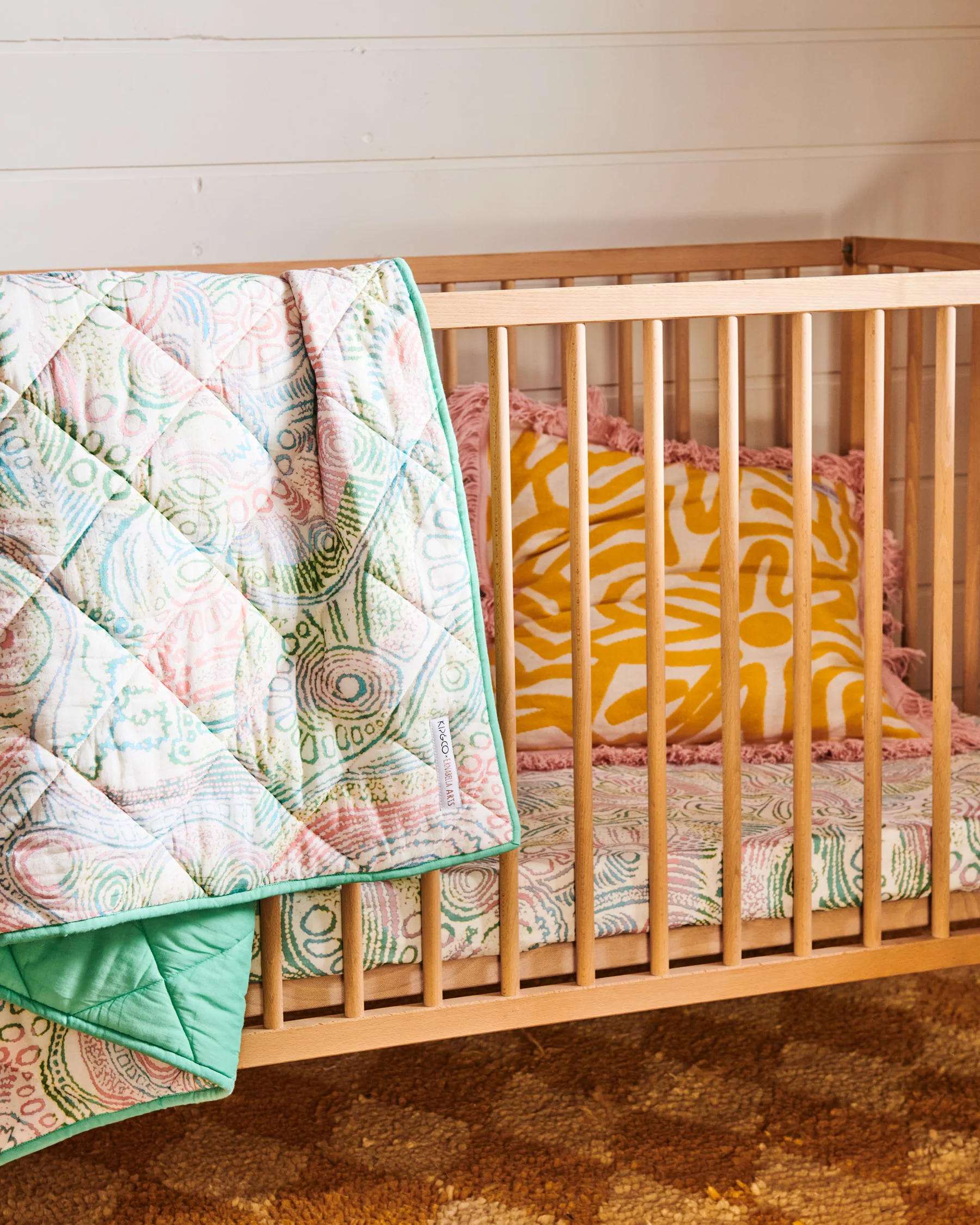 Tjala Tjukurpa Pastel Organic Cotton Quilted Cot Bedspread - Image 5